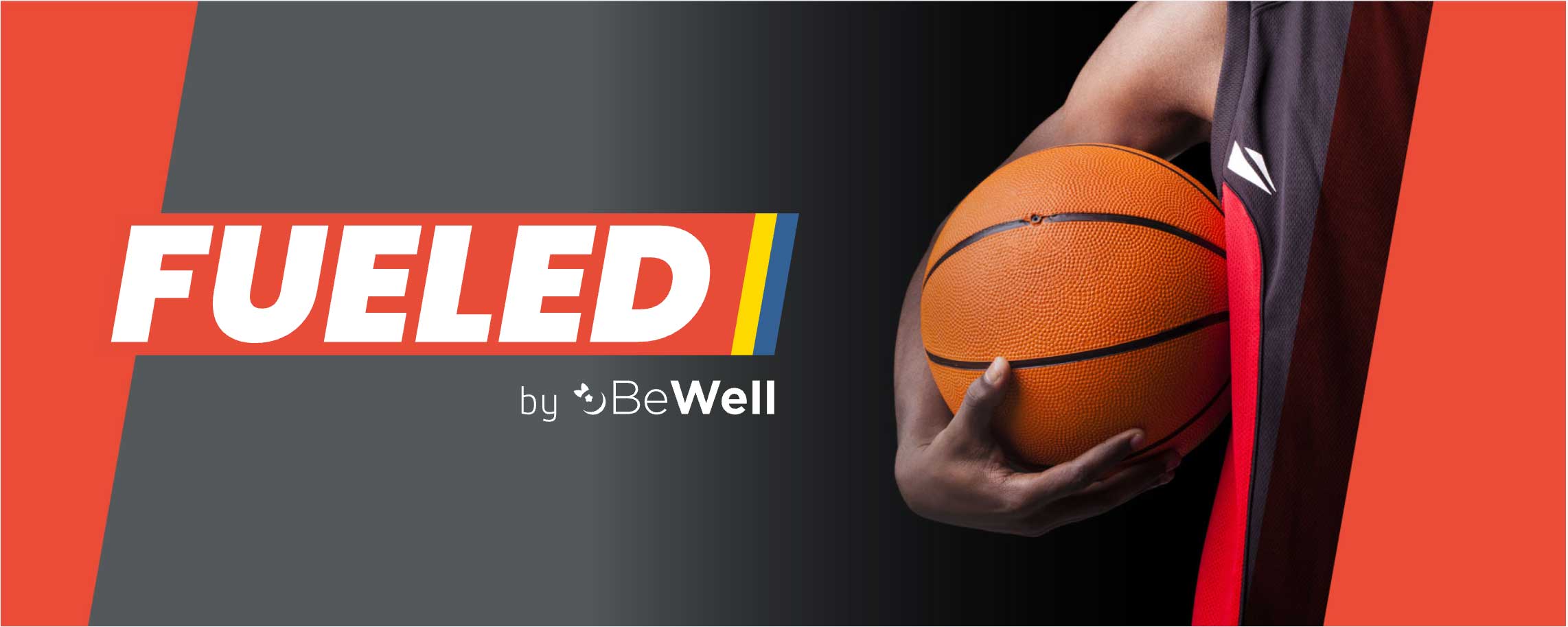 Fueled by BeWell - hand holding basketball
